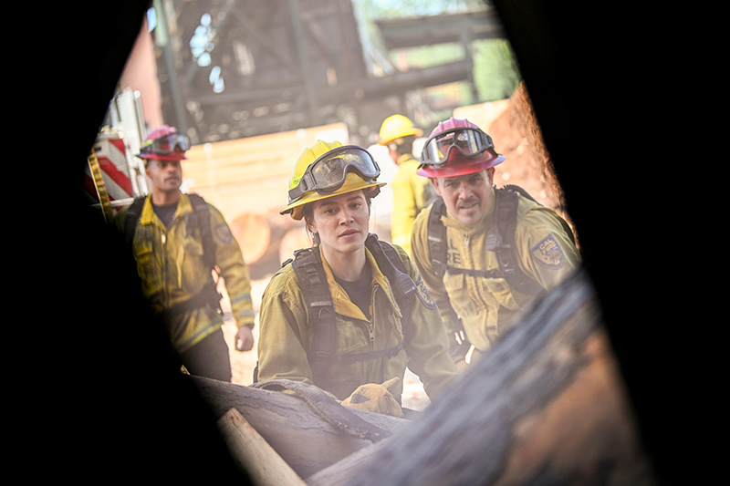 Jordan Calloway as Jake Crawford, Stephanie Arcila as Gabriela Perez, and Kevin Alejandro as Manny Perez in Fire Country Season 4