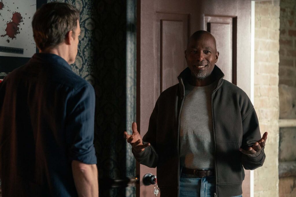 L-R: Michael C. Hall as Dexter Morgan and Ntare Guma Mbaho Mwine as Blessing Kamara in Dexter: Resurrection, episode 1, season 2, streaming on Paramount+, 2026. Photo Credit: Matt Infante/Paramount+.