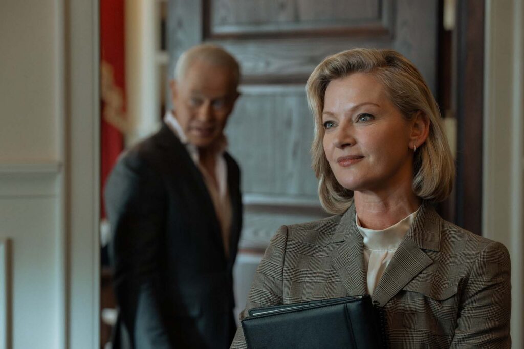 (L-R): Neal McDonough as Cal Thresher and Gretchen Mol as Amanda Clark in Tulsa King, episode 1, season 4, streaming on Paramount+, 2026. Photo Credit: Steve Swisher/Paramount+