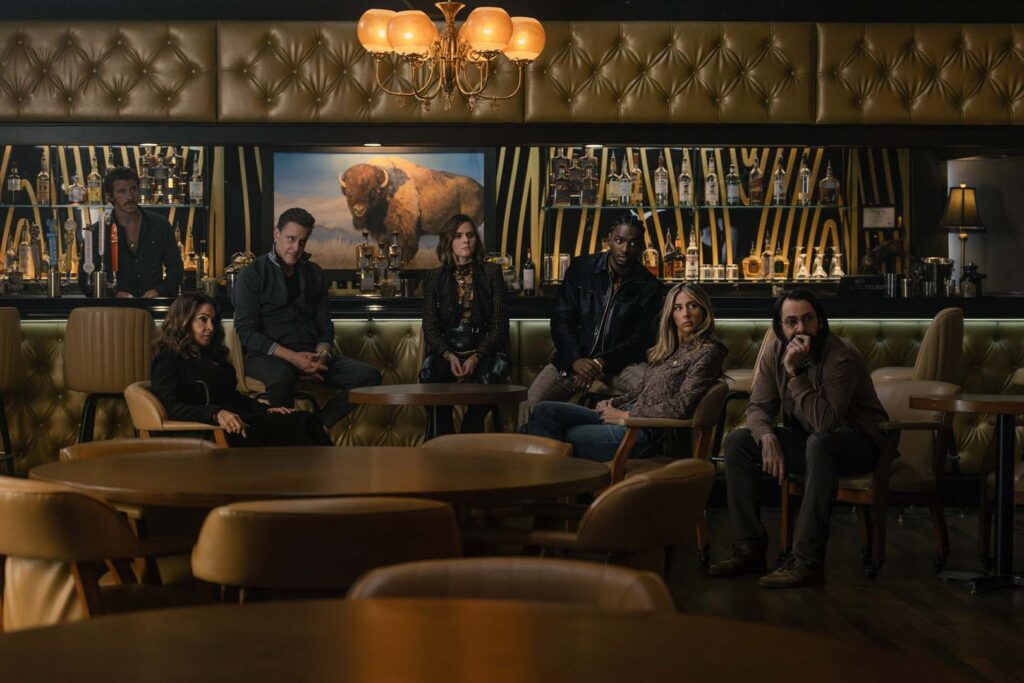 (L-R): Garrett Hedlund as Mitch, Annabella Sciorra as Joanne, Chris Caldovino as Goodie, McKenna Quigley Harrington as Grace, Jay Will as Tyson, Scarlet Stallone as Spencer, and Martin Starr as Bodhi in Tulsa King, episode 2, season 4, streaming on Paramount+, 2026. Photo Credit: Steve Swisher/Paramount+