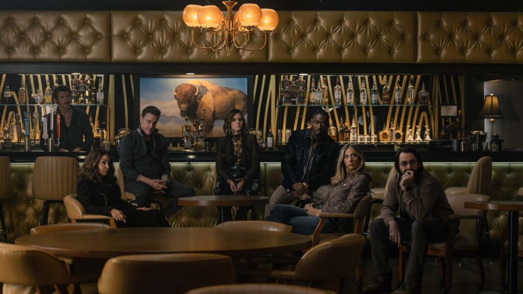 (L-R): Garrett Hedlund as Mitch, Annabella Sciorra as Joanne, Chris Caldovino as Goodie, McKenna Quigley Harrington as Grace, Jay Will as Tyson, Scarlet Stallone as Spencer, and Martin Starr as Bodhi in Tulsa King, episode 2, season 4, streaming on Paramount+, 2026. Photo Credit: Steve Swisher/Paramount+