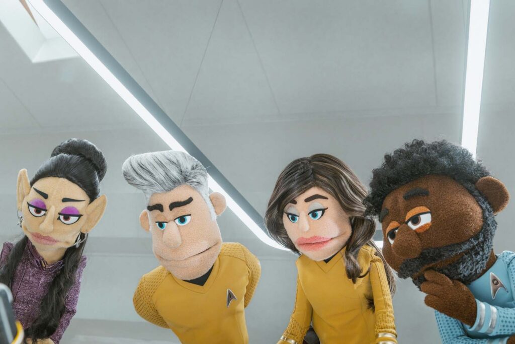 The puppet versions of T'Pring (Gia Sandhu), Capt. Pike (Anson Mount), Una (Rebecca Romijn), and Dr. M’Benga (Babs Olusanmokun) in Season 4, Episode 5 of Star Trek: Strange New Worlds.