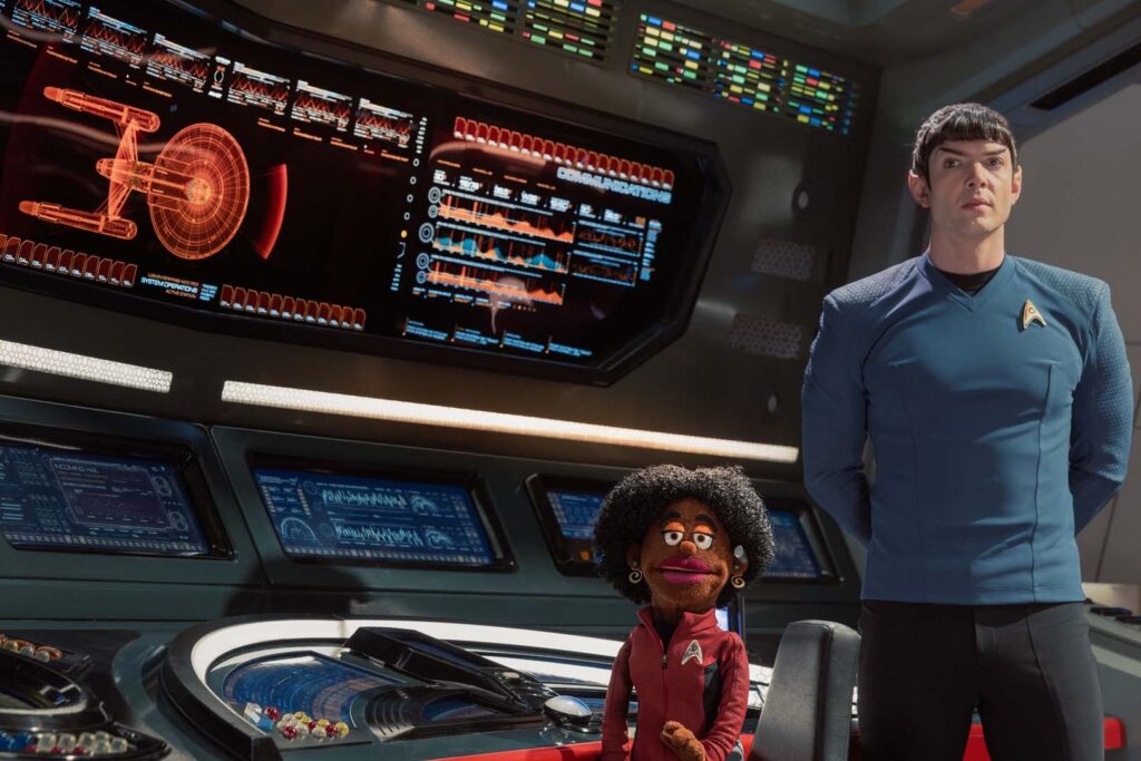 The puppet Uhura (Celia Rose Gooding) and Spock (Ethan Peck) in Season 4, Episode 5 of Star Trek: Strange New Worlds.
