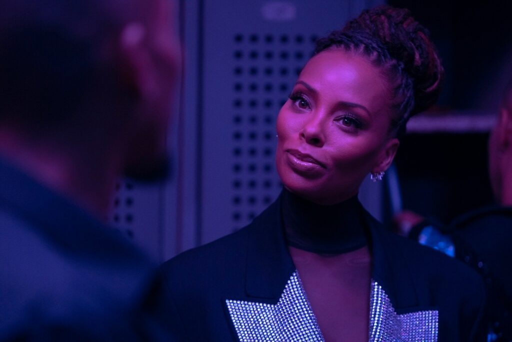 Eva Marcille as Madam in All the Queen's Men on Paramount+