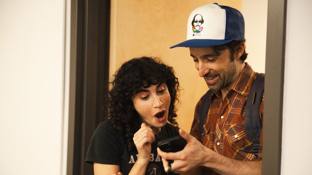 Sarah Yarkin (who plays Rhonda) and Josh Zuckerman (who plays Mr. Martin) share a laugh at School Spirits Season 4 table read 