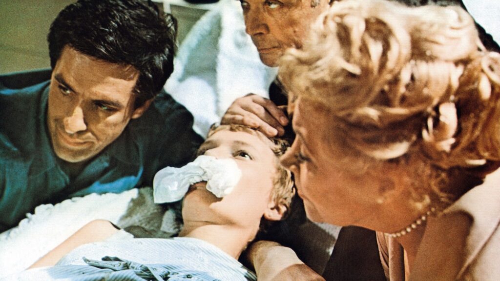 Mia Farrow, John Cassavetes and Ruth Gordon as Minnie Castevet in Rosemary's Baby