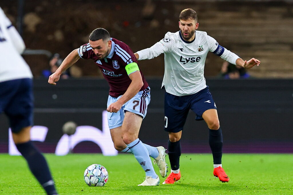 Birmingham, United Kingdom - October 21: John McGinn of Aston Villa and Zlatko Tripic of Viking FK battle for the ball during the UEFA Champions League 2026/2027 match between Aston Villa and Viking FK at Villa Park on October 21, 2026 in Birmingham, United Kingdom.