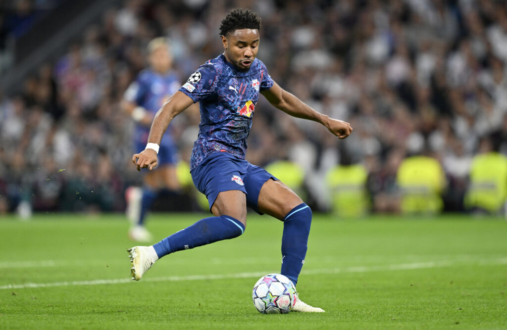 MADRID, SPAIN - OCTOBER 21: Christopher Nkunku of RB Leipzig in action during the UEFA Champions League match between Real Madrid and RB Leipzig at the Santiago Bernabeu Stadium in Madrid, Spain,