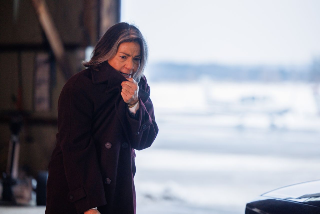 Rachel Ticotin as Eva Santos in Sheriff Country